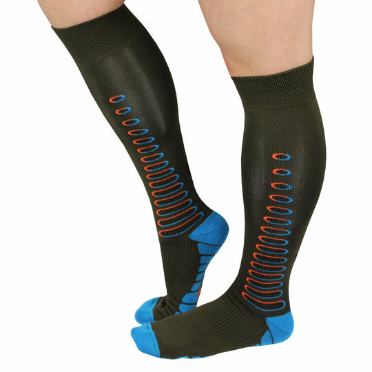 Woman wearing black and purple compression socks