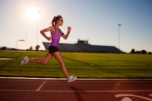 Woman running with graphic running socks